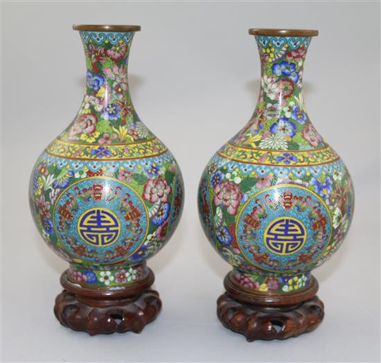 A pair of Chinese cloisonne enamel millefleur baluster vases, early 20th century, total height 22cm